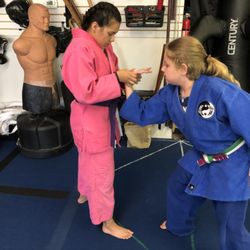 Wolf Den Martial Arts Academy - Young adults working hand techniques!