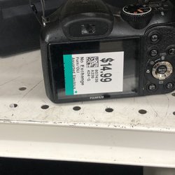 Savers - Poor sticker placement. Right on the LCD screen.