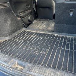 Mickey's Auto Detail - [BEFORE] back mat full of dirt, sand, and hair