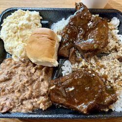 Kelly's Diner - Today's Special: Smothered Steak with Rice & Gravy, Black-Eyed Peas, and Potato Salad.