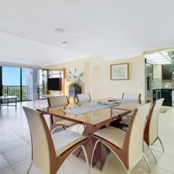 Julie Meltzer - POP Realty Group - Dining Room/Living Room. Furniture is available with purchase.