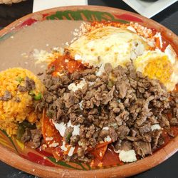 Amigas Restaurant - Chilaquiles with steak and eggs
