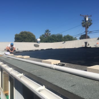 Pure PWR Pools - The solar on the roof (not drilled into the roof, weighted down) - Pool & Hot Tub Service Near Me - Escondido, California