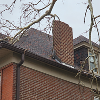 K V Tree Service - Before shot of limb and damaged chimney - Tree Services Near Me K V Tree Service - Before shot of limb and damaged chimney - Tree Services Near Me