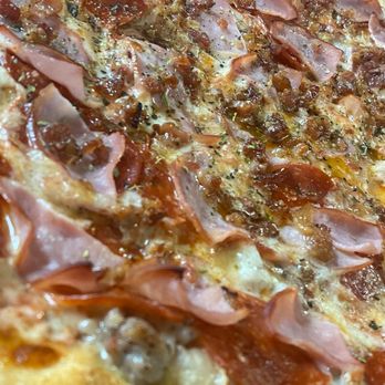 Amelia’s Pizzeria - a closeup of a pizza - Pizza Near Me - West Milwaukee, Wisconsin Amelia’s Pizzeria - a closeup of a pizza - Pizza Near Me - West Milwaukee, Wisconsin
