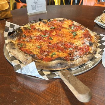 Common Oven Pizza - A large cheese pizza with basil - Pizza Near Me - New Kensington, Pennsylvania Common Oven Pizza - A large cheese pizza with basil - Pizza Near Me - New Kensington, Pennsylvania