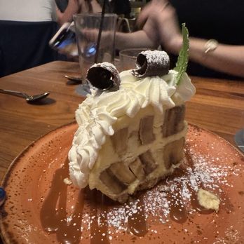 Meril - Bananas Foster Doberge Cake - New American Near Me - New Orleans, Louisiana Meril - Bananas Foster Doberge Cake - New American Near Me - New Orleans, Louisiana