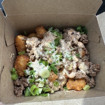 Stuffed Belly - Loaded tater tot's with ground beef, nacho cheese, and green onions. Delicious. - Sandwiches Near Me - Houston, Texas Stuffed Belly - Loaded tater tot's with ground beef, nacho cheese, and green onions. Delicious. - Sandwiches Near Me - Houston, Texas