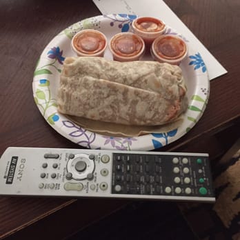 Miguels Jr - Itty-bitty, $8+, machaca breakfast burrito. Put the remote next to it for scale. - Mexican Near Me - Orange, California Miguels Jr - Itty-bitty, $8+, machaca breakfast burrito. Put the remote next to it for scale. - Mexican Near Me - Orange, California