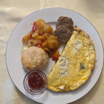 Abilene's Victorian Inn - Fancy egg omelette potatoes sausage and a biscuit, - Bed & Breakfast Near Me - Abilene, Kansas