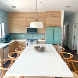 Slab door cabinets are the perfect touch for your modern home. Start your kitchen renovation with Creative Design Services today.