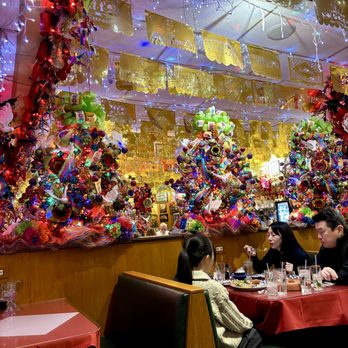 Mi Tierra Cafe & Bakery - Sitting "inside" a Christmas Tree... - Mexican Near Me - San Antonio, Texas
