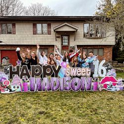Party Over Here Lawn Signs - Yay package. Shown in pic: Black and pink glitter letters. White confetti numbers. Sweet bubble sign. Custom graphics.