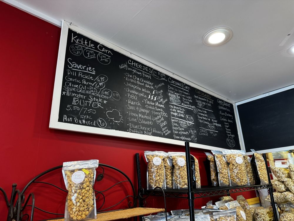 The Popcorn Shop Logo