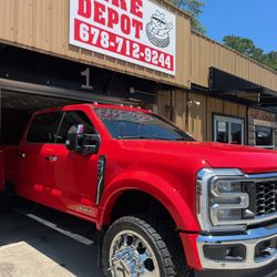 Mike's Tire Depot - 24 F450 with level, Fox 2.0 shocks, and 22 KG1s wrapped with a 35x13.50r22 Nitto recons