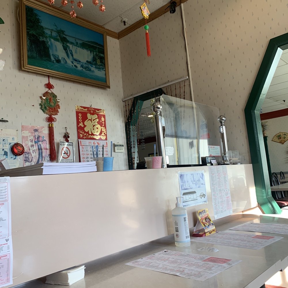 China One - a restaurant counter with menus on it - Chinese Near Me - Waverly, Ohio China One - a restaurant counter with menus on it - Chinese Near Me - Waverly, Ohio