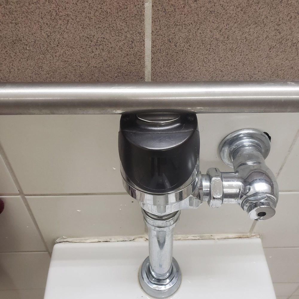 West Valley Mall - Manual toilet flush hidden under the safety bar. - Shopping Centers Near Me - Tracy, California West Valley Mall - Manual toilet flush hidden under the safety bar. - Shopping Centers Near Me - Tracy, California