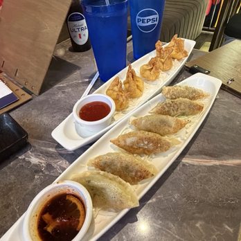 Japones - Crab rangoons and Pan-fried Pork Gyoza - Japanese Near Me - Bloomington, Indiana Japones - Crab rangoons and Pan-fried Pork Gyoza - Japanese Near Me - Bloomington, Indiana