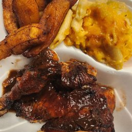 Jerk chicken, plantains, macaroni pie Jerk chicken, plantains, macaroni pie