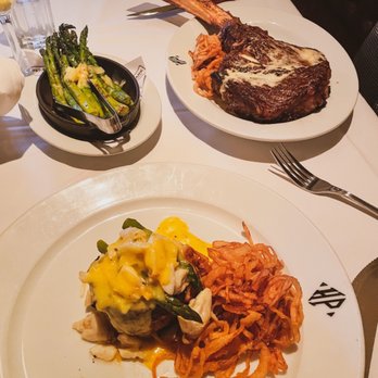 Hyde Park Prime Steakhouse - Long Bone Tomahawk Ribeye 40oz, Oscar Style 8oz Filet, Sauteed Asparagus - Steakhouses Near Me - Westlake, Ohio Hyde Park Prime Steakhouse - Long Bone Tomahawk Ribeye 40oz, Oscar Style 8oz Filet, Sauteed Asparagus - Steakhouses Near Me - Westlake, Ohio