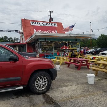 Big Chief Drive-In - a red truck parked in front of a restaurant - Burgers Near Me - Glencoe, Alabama