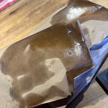 Bloom Bake Shop - Inside bag oil and outside bag oil. Two bags that held the bread are full of oil - Bakeries Near Me - Madison, Wisconsin