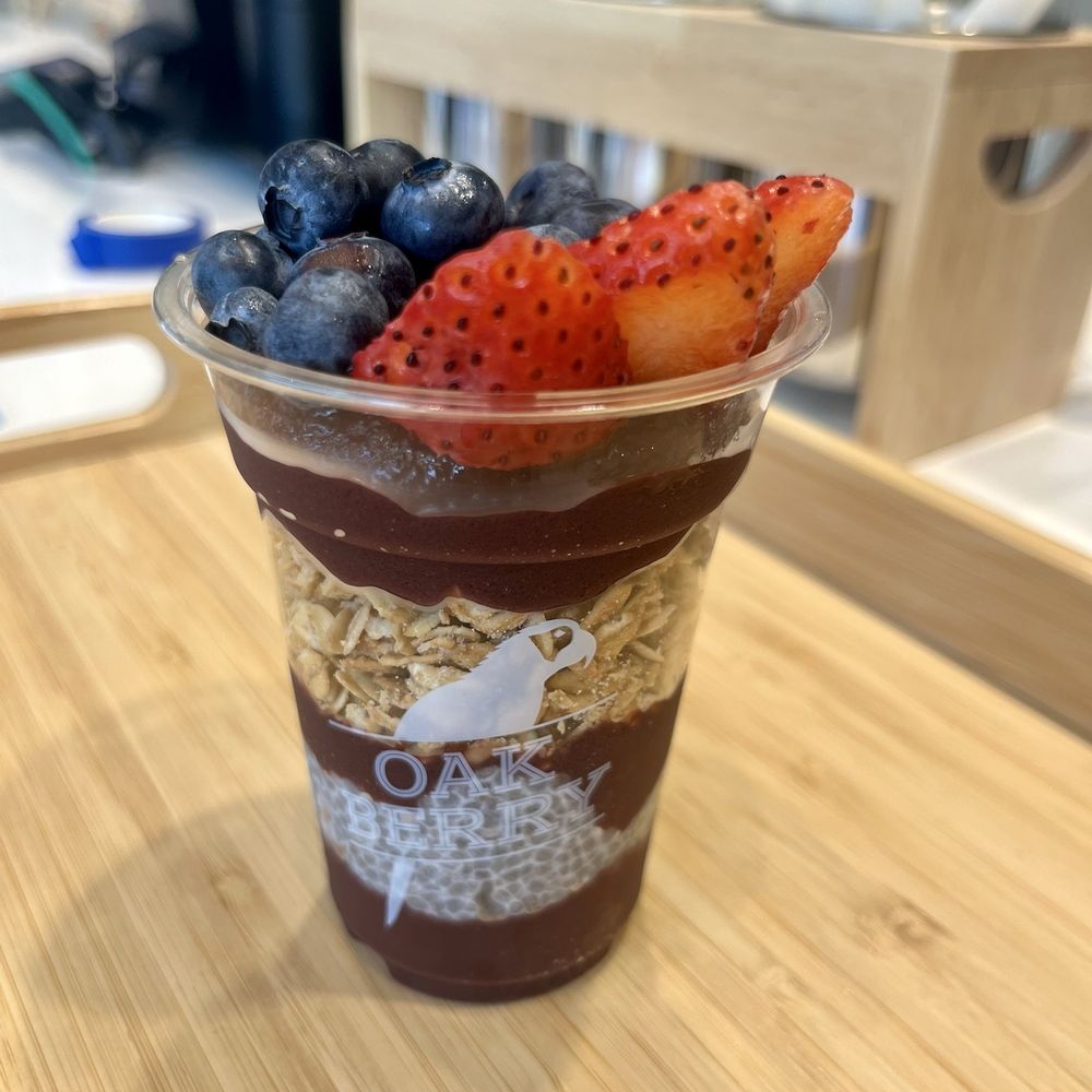 Oakberry Acai - Crunchy Bowl- Açaí, granola, and chia seeds topped with strawberries and blueberries (mini from Ship & Shop) - Acai Bowls Near Me - Long Beach, California Oakberry Acai - Crunchy Bowl- Açaí, granola, and chia seeds topped with strawberries and blueberries (mini from Ship & Shop) - Acai Bowls Near Me - Long Beach, California