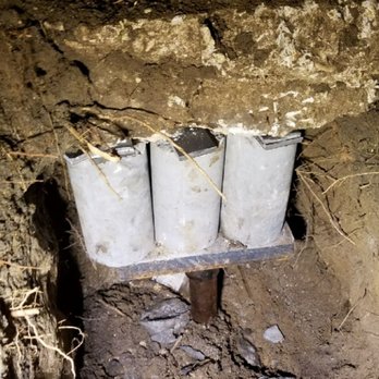 CastleRock Foundation Repair - Steel piers are pressed into the earth until they reach bedrock. - Excavation Services Near Me - Austin, Texas CastleRock Foundation Repair - Steel piers are pressed into the earth until they reach bedrock. - Excavation Services Near Me - Austin, Texas