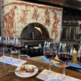 Wine flights with complimentary shrimp croquets. Wine flights with complimentary shrimp croquets.