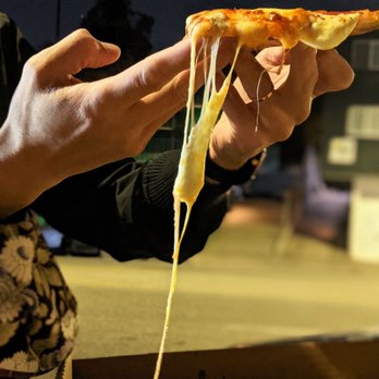 Nico's Pizza - Cheese pull - Pizza Near Me - Los Angeles, California Nico's Pizza - Cheese pull - Pizza Near Me - Los Angeles, California