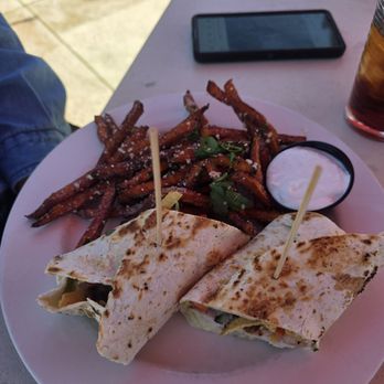 Houlihan's - Southwest chicken wrap with sweet potato fries - Bars Near Me - Columbus, Georgia Houlihan's - Southwest chicken wrap with sweet potato fries - Bars Near Me - Columbus, Georgia