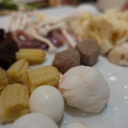 Mr Pot Hot Pot - Lobster ball, meat balls, baby corn, tree eat (black mushroom), cauliflower, mushrooms, squid, and quail eggs.