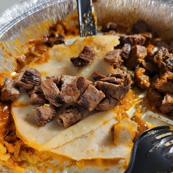 Maria Rita's Tex-Mex - Inside of the "fajita enchiladas" - Tex-Mex Near Me - Houston, Texas Maria Rita's Tex-Mex - Inside of the "fajita enchiladas" - Tex-Mex Near Me - Houston, Texas