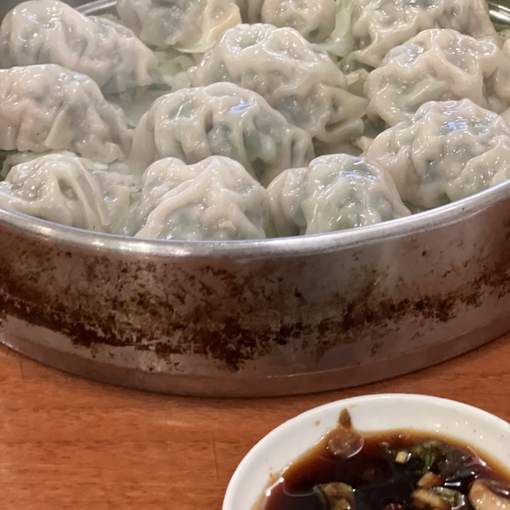 Olympic Noodle - Steamed Dumplings. Fillings are pork and chives. The sauce for the dumplings are "Do-it-yourself" with condiments placed per table. - Korean Near Me - Los Angeles, California Olympic Noodle - Steamed Dumplings. Fillings are pork and chives. The sauce for the dumplings are "Do-it-yourself" with condiments placed per table. - Korean Near Me - Los Angeles, California