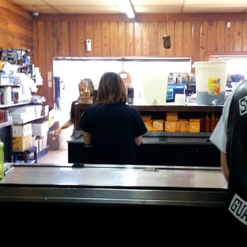 City Market - the cashier where you buy your cheese, beans, potato salad and tea or Big Red. - Barbeque Near Me - Luling, Texas