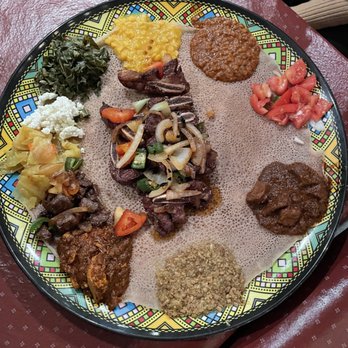 Dukem Ethiopian Restaurant - Combination 26, injera, and goden tibs in the middle. - Ethiopian Near Me - Washington, DC, District of Columbia