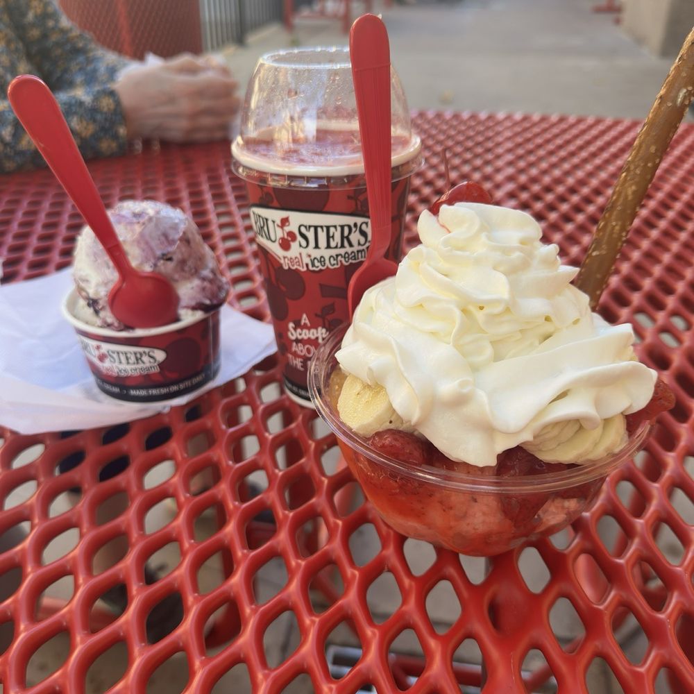 Banana split in bowl, sundaes with 2 flavors and a shake