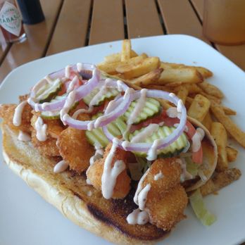 Doc's Seafood & Steaks - This shrimp po-boy looks pretty. But it tasted pretty awful. Tasted like store bought frozen Panko shrimp. - Seafood Near Me - Corpus Christi, Texas Doc's Seafood & Steaks - This shrimp po-boy looks pretty. But it tasted pretty awful. Tasted like store bought frozen Panko shrimp. - Seafood Near Me - Corpus Christi, Texas