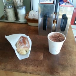 Hot chocolate and chocolate croissant.