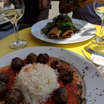 Uncle Momo - Lamb kofta with rice (front) and smoked salmon crepes (far back). - Lebanese Near Me - Jersey City, New Jersey Uncle Momo - Lamb kofta with rice (front) and smoked salmon crepes (far back). - Lebanese Near Me - Jersey City, New Jersey