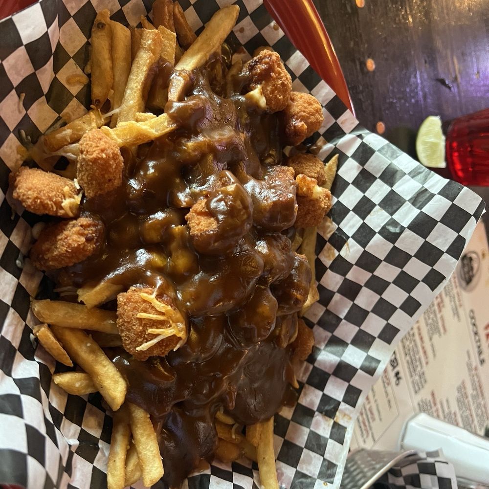 The Thomas Meagher Bar - They changed the Poutine with breaded cheese curds no a fan go back to plain cheese curds - Irish Near Me - Missoula, Montana