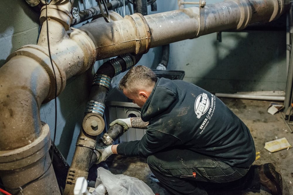 Slide of John's Sewer & Drain Cleaning