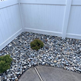 LeClaire Landscaping - a white fence and gravel area - Landscaping Near Me LeClaire Landscaping - a white fence and gravel area - Landscaping Near Me