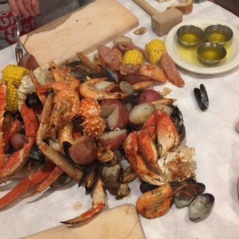 The Crab Pot - A Seafeast with Dungeness crab, King crab, Clams, Shrimp, Sausage and more - Seafood Near Me - Seattle, Washington The Crab Pot - A Seafeast with Dungeness crab, King crab, Clams, Shrimp, Sausage and more - Seafood Near Me - Seattle, Washington