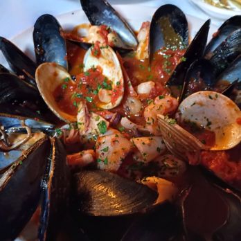 Manducatis - Hot fish antipasto . A meal in itself. Delicious and the sauce is perfect for bread-dipping - Italian Near Me - Long Island City, New York Manducatis - Hot fish antipasto . A meal in itself. Delicious and the sauce is perfect for bread-dipping - Italian Near Me - Long Island City, New York