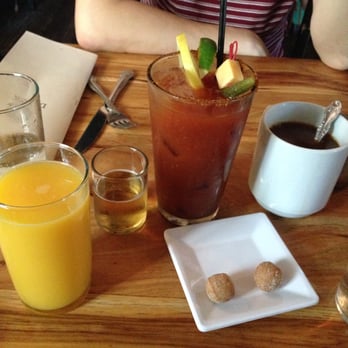 Longman & Eagle - Fresh OJ, Bloody Mary w/ Vodka and Sidecar, Coffee, and complimentary raspberry doughnut holes - Gastropubs Near Me - Chicago, Illinois Longman & Eagle - Fresh OJ, Bloody Mary w/ Vodka and Sidecar, Coffee, and complimentary raspberry doughnut holes - Gastropubs Near Me - Chicago, Illinois