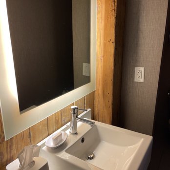 SpringHill Suites by Marriott Montgomery Downtown - Bathroom. Has a door/windows that used to be the office of the furniture warehouse - Hotels Near Me - Montgomery, Alabama SpringHill Suites by Marriott Montgomery Downtown - Bathroom. Has a door/windows that used to be the office of the furniture warehouse - Hotels Near Me - Montgomery, Alabama