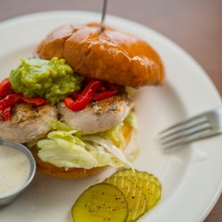 Bluffside Grill & Bar - California Chicken Sandwich - Char Grilled Breast, Roasted Red Peppers, Guacamole, Shredded Lettuce, Toasted Egg Bun
