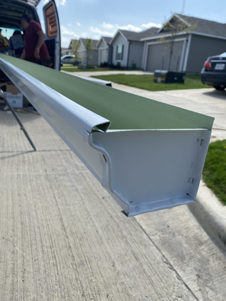 Slide of Holguin Roofing & Exteriors