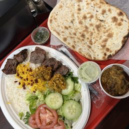 Beef Kabob, plus two fritters for Iftar Beef Kabob, plus two fritters for Iftar